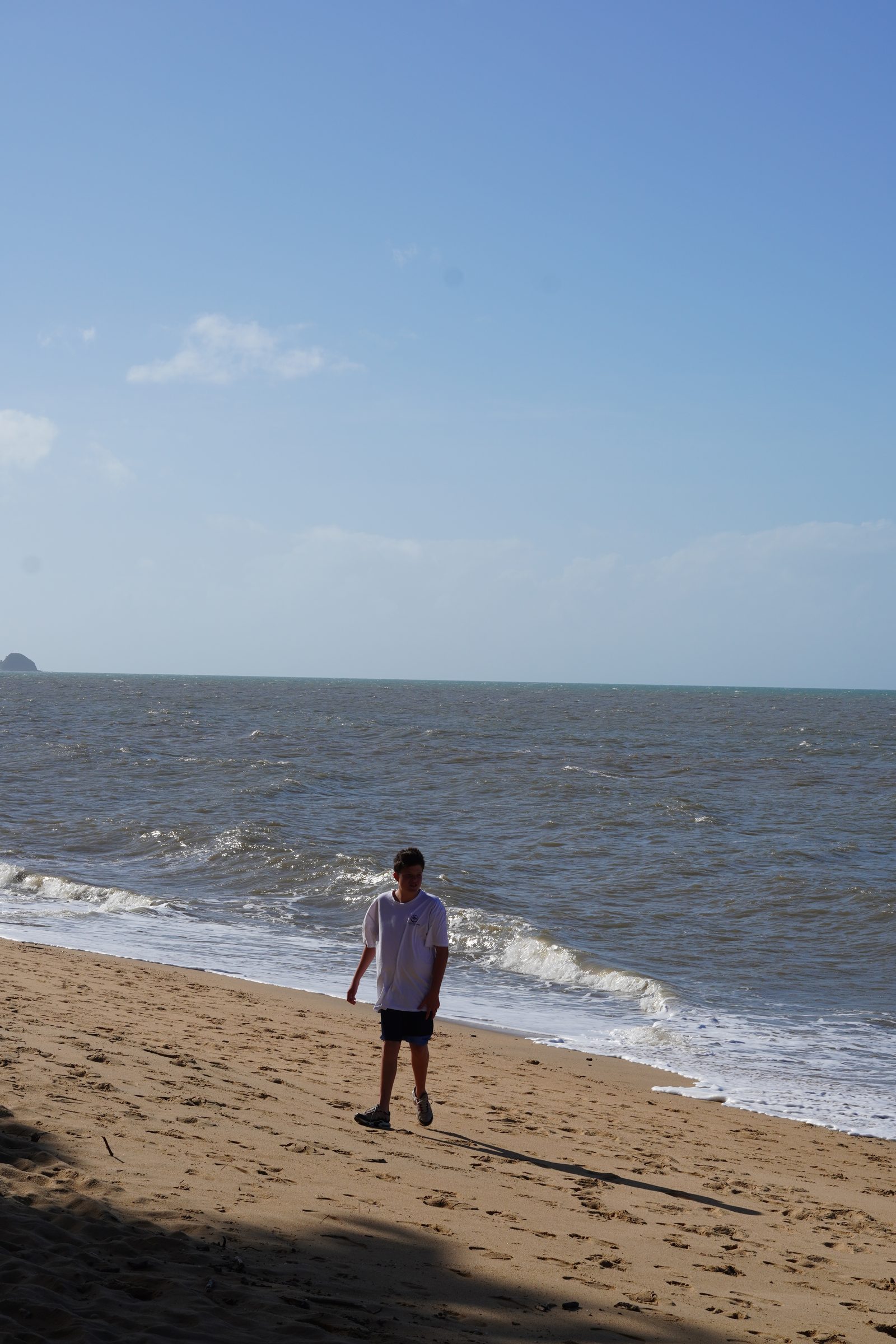 A Coastline Care participant out on a Cairns beach